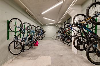 A bike rack with many bikes on it